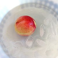 peach in ice bath